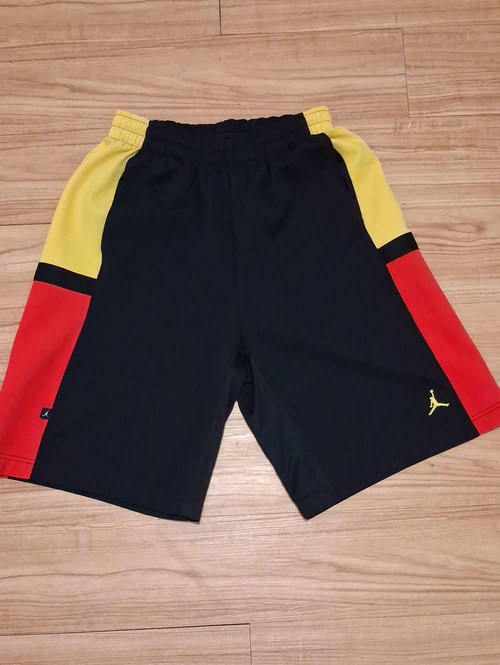 Jordan Black Athletic Shorts with Red & Yellow Panels